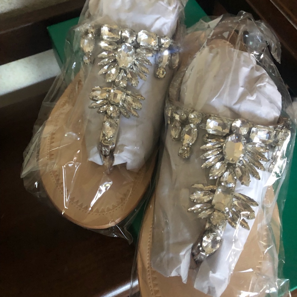 Brand new in packaging sandals.
